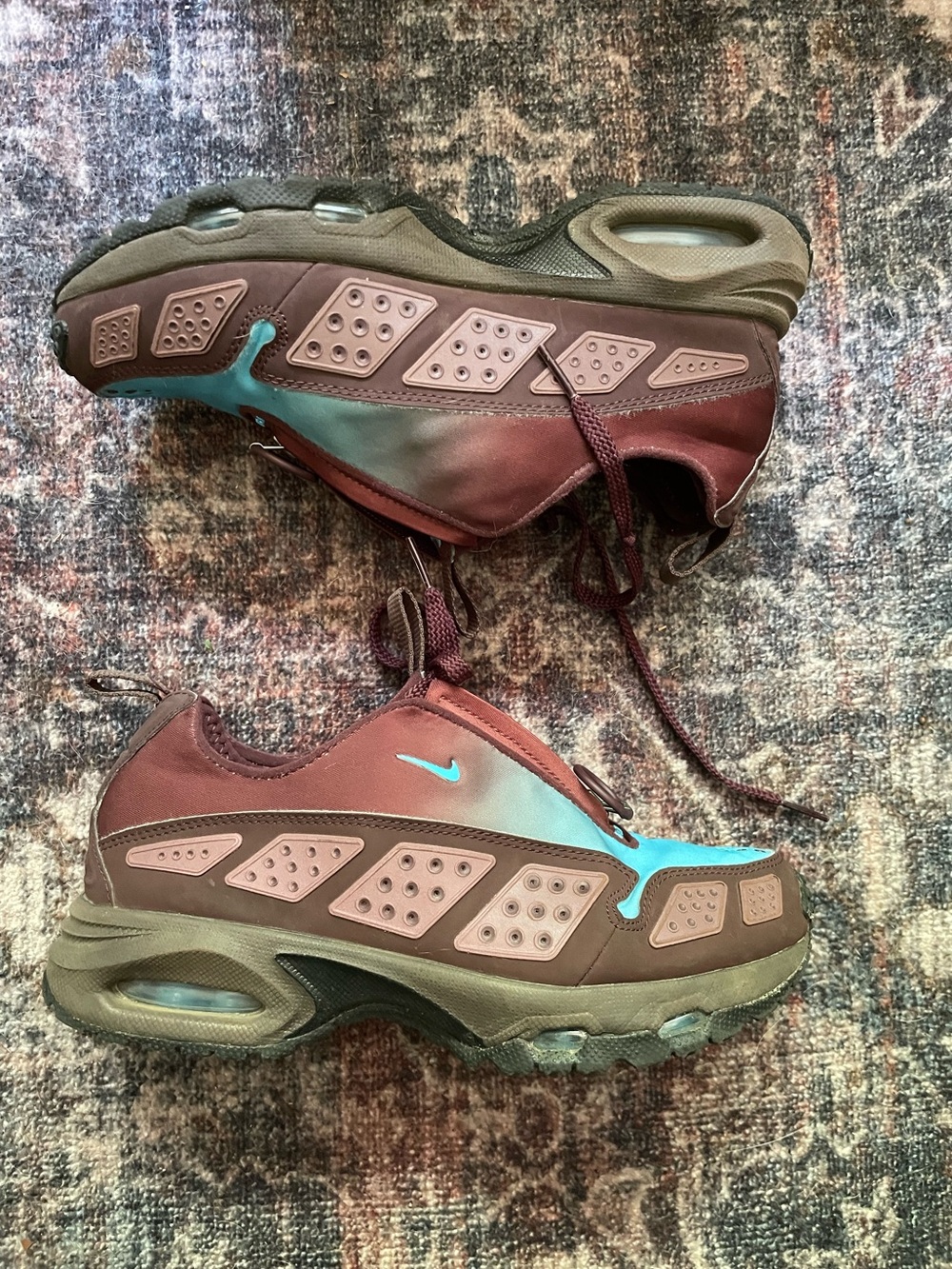Nike Air Max SNDR sneakers in the "Burgundy Crush" and Baltic Blue colorway